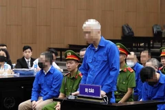 Bị cáo Trần Văn Tám - cựu Tổng Giám đốc Tổng Công ty Đầu tư Phát triển Đường Cao tốc Việt Nam (VEC), cựu Chủ tịch Hội đồng Nghiệm thu cơ sở. (Ảnh: Phạm Kiên/TTXVN)