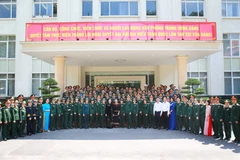 Bà Trương Thị Mai và đại biểu dự buổi gặp mặt. (Ảnh: Phương Hoa/TTXVN)