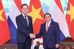 Thủ tướng Phạm Minh Chính và Thủ tướng Hà Lan Mark Rutte. (Ảnh: Dương Giang/TTXVN)