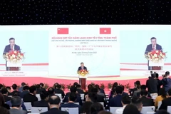Chủ tịch UBND thành phố Hà Nội Trần Sỹ Thanh phát biểu khai mạc Hội nghị. (Ảnh: TTXVN)