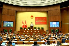 Ủy viên Bộ Chính trị, Thủ tướng Chính phủ Phạm Minh Chính truyền đạt chuyên đề: 'Tiếp tục đổi mới, nâng cao chất lượng chính sách xã hội, đáp ứng yêu cầu sự nghiệp xây dựng và bảo vệ Tổ quốc trong giai đoạn mới.' (Ảnh: Phương Hoa/TTXVN)