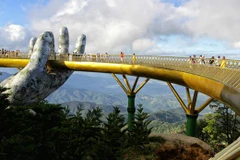 Cầu Vàng đang làm điểm đến hấp dẫn du khách ở Đà Nẵng. (Nguồn: AFP)