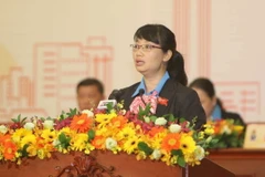 Chủ tịch Liên đoàn Lao động thành phố Hồ Chí Minh Trần Thị Diệu Thúy phát biểu khai mạc đại hội. (Ảnh: Thanh Vũ/TTXVN)