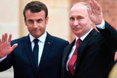 Tổng thống Nga Vladimir Putin và người đồng cấp Pháp Emmanuel Macron. (Nguồn: AFP)