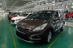 Xe ôtô thành phẩm tại Khu phức hợp sản xuất và lắp ráp ôtô Chu Lai- Trường Hải (Quảng Nam). (Ảnh: Đỗ Trưởng/TTXVN)