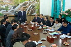 Chủ tịch nước Trần Đại Quang, Trưởng Ban Chỉ đạo cải cách Tư pháp Trung ương đến thăm, làm việc với Văn phòng Thường trực Ban Chỉ đạo cải cách Tư pháp Trung ương. (Ảnh: Nhan Sáng/TTXVN)