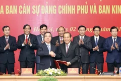 Lễ ký quy chế phối hợp công tác giữa Ban Cán sự đảng Chính phủ và Ban Kinh tế Trung ương. (Ảnh: Thống Nhất/TTXVN)