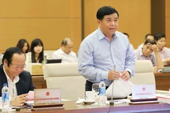 Bộ trưởng Bộ Kế hoạch và Đầu tư Nguyễn Chí Dũng phát biểu ý kiến. (Ảnh: Phương Hoa/TTXVN)