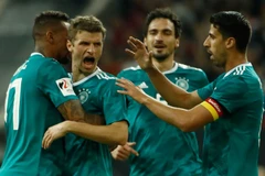 Thomas Müller (thứ hai bên trái) cùng các đồng đội ăn mừng sau khi ghi bàn thắng gỡ hoà 1-1 trong trận đấu với Tây Ban Nha. (Nguồn: AFP)
