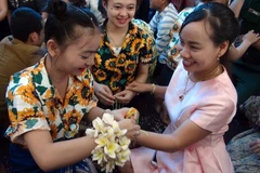 Gặp gỡ hữu nghị Việt Nam-Lào chào mừng Tết Cổ truyền Bunpimay Lào 