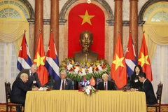 Việt Nam và Cuba ký kết Hiệp định thương mại. (Ảnh: TTXVN)