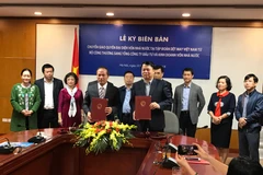 Lễ chuyển giao quyền đại diện vốn nhà nước tại Vinatex từ Bộ Công Thương về SCIC. (Ảnh: Đức Duy/Vietnam+)