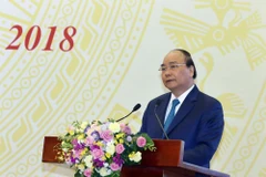 Thủ tướng Nguyễn Xuân Phúc phát biểu ý kiến tại Hội nghị Chính phủ với địa phương ngày 2/7. (Ảnh: TTXVN)