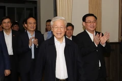 Tổng Bí thư, Chủ tịch nước Nguyễn Phú Trọng đến Hội nghị lấy ý kiến nhận xét và tín nhiệm cử tri nơi cư trú. (Ảnh: Trí Dũng/TTXVN)