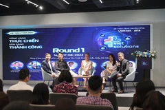 Các khách mời tham dự tại hội thảo trong khuôn khổ cuộc thi Viet Solutions 2022. (Ảnh: Minh Sơn/Vietnam+)