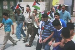 Những hình ảnh trong bộ phim tài liệu do đoàn nhà báo Việt Nam tác nghiệp tại Palestine. (Nguồn: Internet)