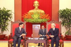 Tổng Bí thư Nguyễn Phú Trọng tiếp Phó Thủ tướng Lào Thoongloun Sisoulith. (Ảnh: Trí Dũng/ TTXVN)