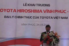 Ông Phùng Quang Hùng, Chủ tịch UBND tỉnh Vĩnh Phúc phát biểu chúc mừng tại lễ khai trương Công ty TNHH Toyota Hiroshima Vĩnh Phúc- HT. (Ảnh: Trọng Lịch/Vietnam+)