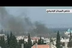 Cảnh đổ nát tại Qusayr sau xung đột ngày 20/5. (Hình ảnh do Đài truyền hình nhà nước Syria cung cấp. Nguồn :AFP/TTXVN)