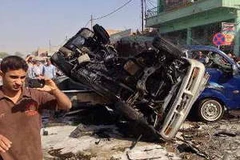 Hiện trường một vụ nổ ở Aziziyah, phía nam thủ đô Baghdad ngày 16/6. (Nguồn: AFP/TTXVN)