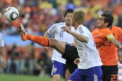 Các cầu thủ đội tuyển Nhật Bản trong trận đấu với tuyển Hà Lan ở bảng E ngày 19/6. (Nguồn: AFP/TTXVN)