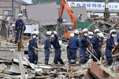 Khắc phục hậu quả động đất và sóng thần tại tỉnh Miyagi ngày 18/6. (Nguồn: AFP/TTXVN)