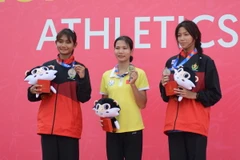 Vận động viên Lê Thị Tuyết Mai đoạt Huy chương Vàng ở nội dung chạy 400m nữ. (Ảnh: Văn Dũng/TTXVN)