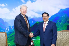 Thủ tướng Phạm Minh Chính tiếp ông Richard W. Smith, Chủ tịch kiêm Tổng giám đốc điều hành của Tập đoàn FedEx Express. (Ảnh: Dương Giang/TTXVN)