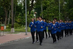 Đoàn VĐV rước đuốc xuất phát từ Bảo tàng Hồ Chí Minh chi nhánh Quân khu 5 (thành phố Đà Nẵng). (Ảnh: Văn Dũng/TTXVN)