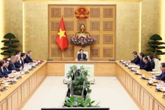 Phó Thủ tướng Trần Lưu Quang tiếp Đoàn doanh nghiệp Hội đồng kinh doanh EU-ASEAN. (Ảnh: An Đăng/TTXVN)