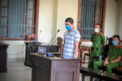 Bị cáo Nguyễn Bá Minh tại tòa. (Ảnh: TTXVN)