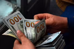 Nếu Fed mạnh tay thắt chặt chính sách tiền tệ, điều này cũng có thể gây bất lợi cho các ngân hàng lớn. (Ảnh: THX/TTXVN)