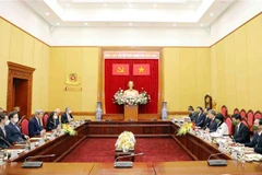 Đại tướng Tô Lâm, Ủy viên Bộ Chính trị, Bộ trưởng Bộ Công an tiếp Đặc phái viên của Tổng thống Hoa Kỳ về Biến đổi khí hậu John Kerry. (Ảnh: TTXVN)