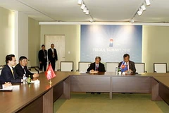 Quang cảnh cuộc gặp. (Ảnh: Đức Tám/TTXVN)