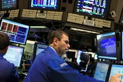 Tại sàn giao dịch Thị trường chứng khoán New York. (Ảnh: AFP/TTXVN)