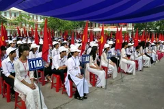 Học sinh dự lễ khai giảng. (Ảnh minh họa. Nguồn: TTXVN)