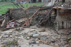 Cảnh tàn phá do lũ lụt tại miền Nam Trung Quốc hồi giữa năm 2015. (Nguồn: THX/TTXVN)