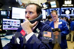 Giao dịch viên làm việc tại sàn giao dịch chứng khoán New York, Mỹ. (Nguồn: EPA/TTXVN)