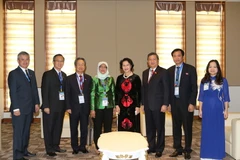 Chủ tịch Quốc hội Nguyễn Thị Kim Ngân gặp song phương Chủ tịch Quốc hội Singapore, bà Halimah Yacob. (Ảnh: Trọng Đức/TTXVN)