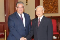 Tổng Bí thư Nguyễn Phú Trọng tiếp Tổng Bí thư Đảng Cộng sản Hy Lạp Dimitrios Koutsoumpas đang thăm và làm việc tại Việt Nam. (Ảnh: Trí Dũng/TTXVN) 