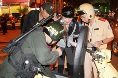 Lực lượng chức năng ra quân trấn áp tội phạm. (Ảnh minh họa. Nguồn: TTXVN)