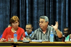 Ủy viên Bộ Chính trị, Tổng thư ký Liên đoàn Lao động Cuba Ulises Guilarte de Nacimiento điều hành phiên họp. (Ảnh: Lê Hà/TTXVN) 