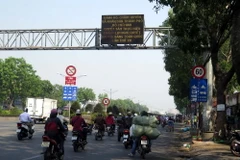 Đường Trường Chinh (quận Tân Bình, Thành phố Hồ Chí Minh) đã thay biển hạn chế tốc độ thành 60km/giờ. (Ảnh: Hoàng Hải/TTXVN)