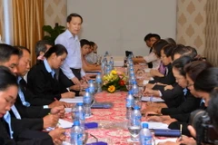 Đoàn hãng Thông tấn xã Lào (KPL) thăm và trao đổi nghiệp vụ với Báo Nghệ An. (Ảnh: Thanh Tùng/TTXVN) 