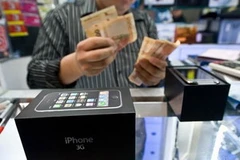 Tập đoàn Apple Inc đạt doanh số bán kỷ lục trong quý III, cho thấy sức mua của người tiêu dùng Mỹ đang phục hồi. (Ảnh: Internet)