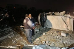 Máy bay Israel phá hủy một nhà máy sản xuất bơ sữa nhỏ ở thành phố Gaza. (Ảnh: Xinhua/AFP)