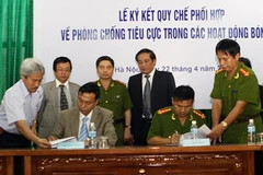 Lễ ký kết quy chế phối hợp giữa VFF và C14. (Ảnh: Hữu Việt/TTXVN)