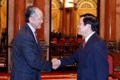 Chủ tịch nước Trương Tấn Sang tiếp ông Jim Yong Kim, Chủ tịch Ngân hàng Thế giới (WB) đang thăm và làm việc tại Việt Nam. (Ảnh: Thống Nhất/TTXVN)