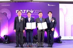 Lễ ký kết hợp tác tại Hội chợ. (Nguồn: Aving News)