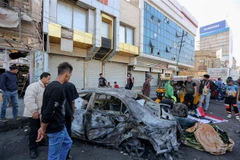 Hiện trường một vụ nổ bom ở quảng trường Tahrir, thủ đô Baghdad, Iraq. (Ảnh: AFP/TTXVN)